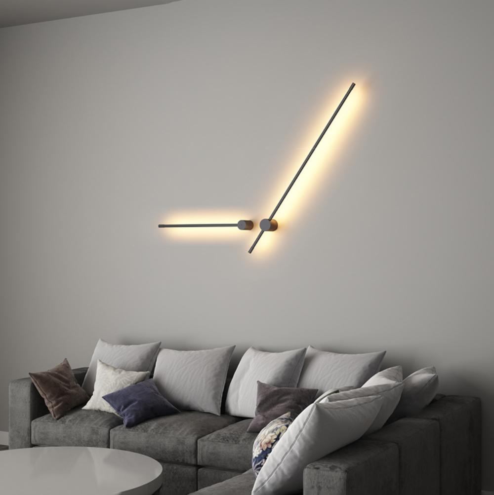 Linear LED wall light shown glowing in a dim interior