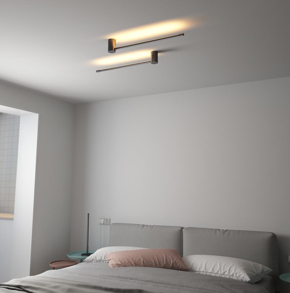 Slim tube wall light marking a wall with a soft line of light