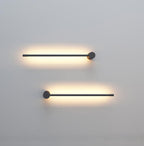 Slim LED tube light mounted on the ceiling casting soft glow
