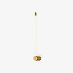 Slim LED tube wall sconce marking a gallery wall softly