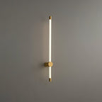 Vertical metal and acrylic wall sconce with warm glowing line