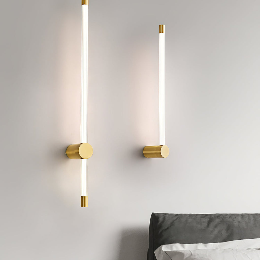 Linear LED wall sconce glowing warm in a hallway setting