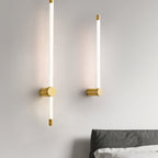 Linear LED wall sconce glowing warm in a hallway setting