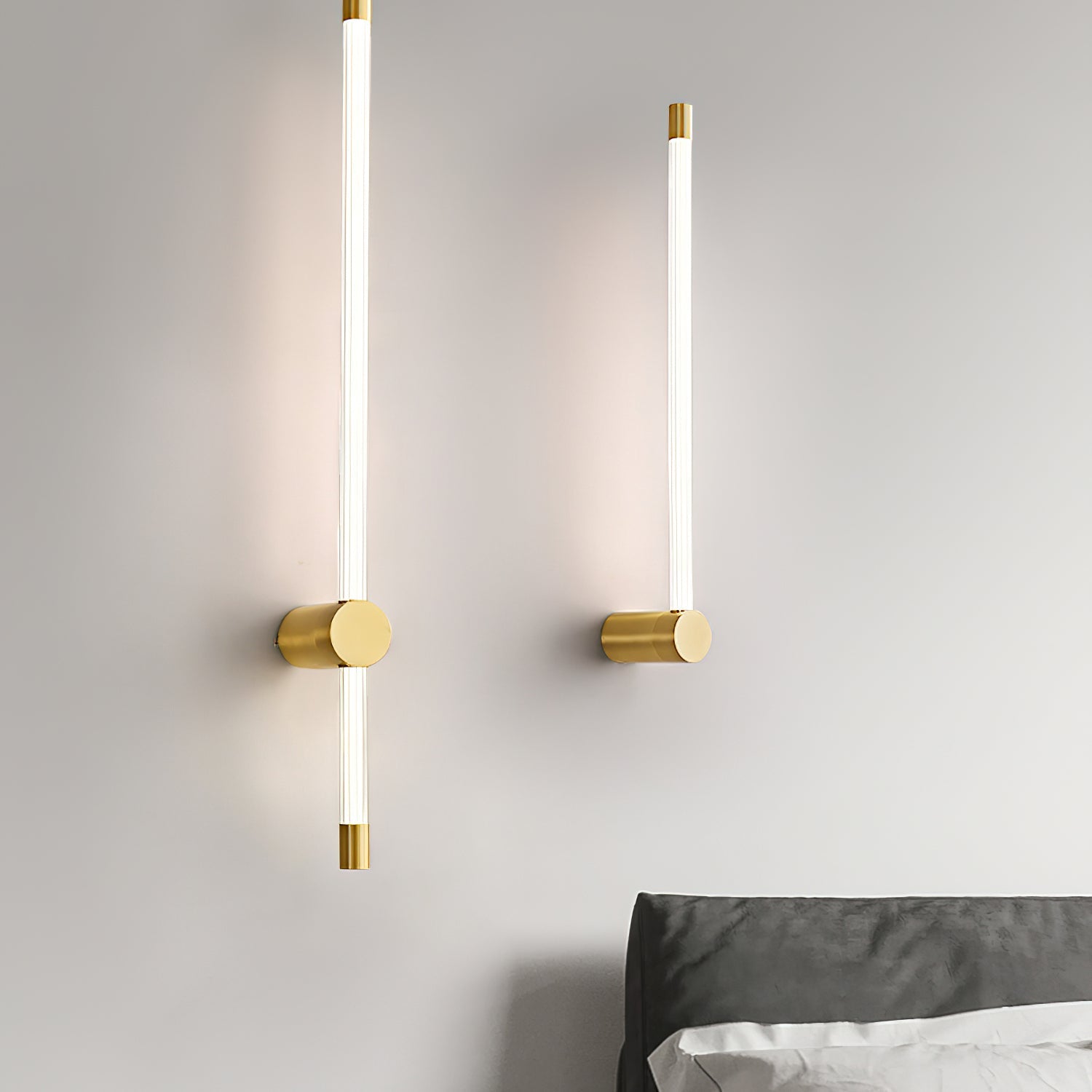 Linear LED wall sconce glowing warm in a hallway setting