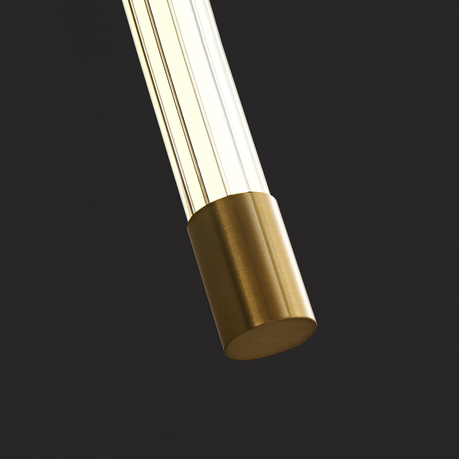 Linear LED wall sconce glowing warm in a styled interior