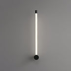 Slim LED wall sconce marking a wall niche with soft light