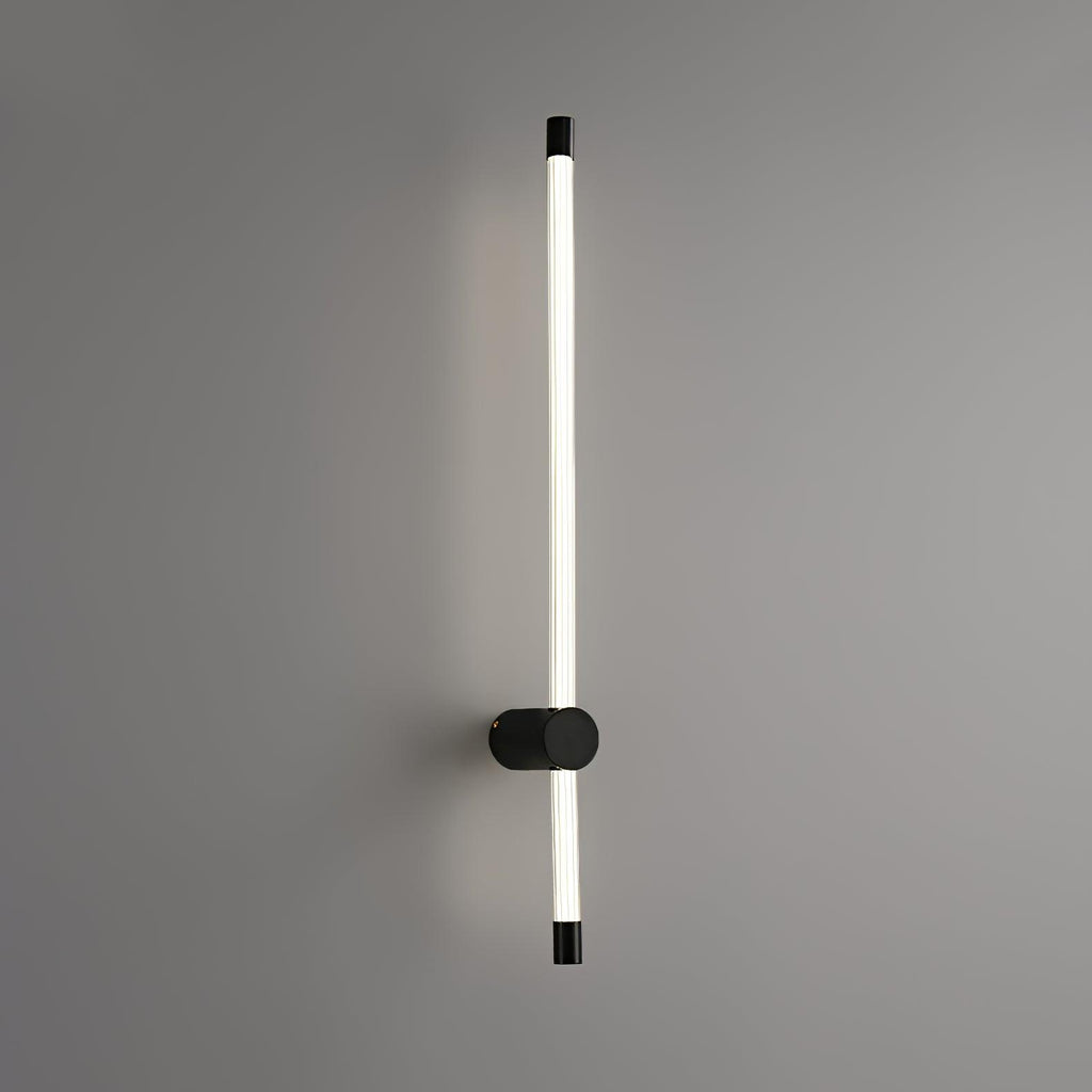 Linear LED wall sconce throwing a clean vertical line of light