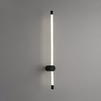 Linear LED wall sconce throwing a clean vertical line of light