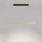 This Clérachic pendant's dark walnut canopy and travertine bar glow warm along the underside, shown on a grey backdrop.
