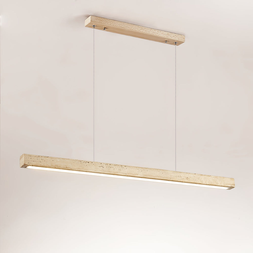 Shown against a warm beige backdrop, this Clérachic pendant's travertine bar glows along its underside.