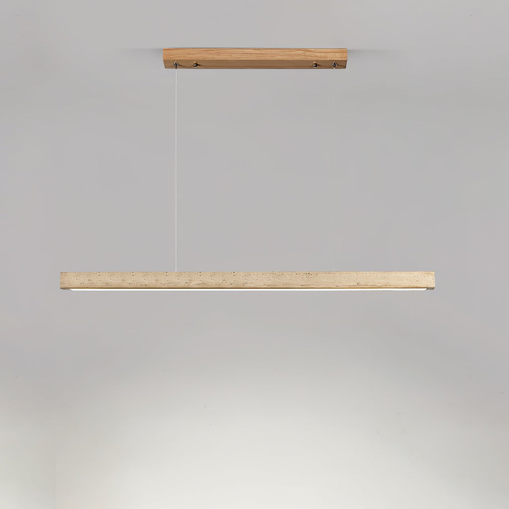 This Clérachic pendant's pale wood canopy and travertine bar glow warm along the underside, shown on a grey backdrop.