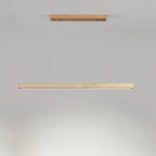This Clérachic pendant's pale wood canopy and travertine bar glow warm along the underside, shown on a grey backdrop.