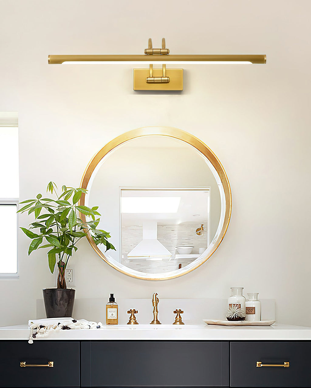 Dark bronze vanity wall light mounted above a bathroom mirror