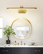 Dark bronze vanity wall light mounted above a bathroom mirror