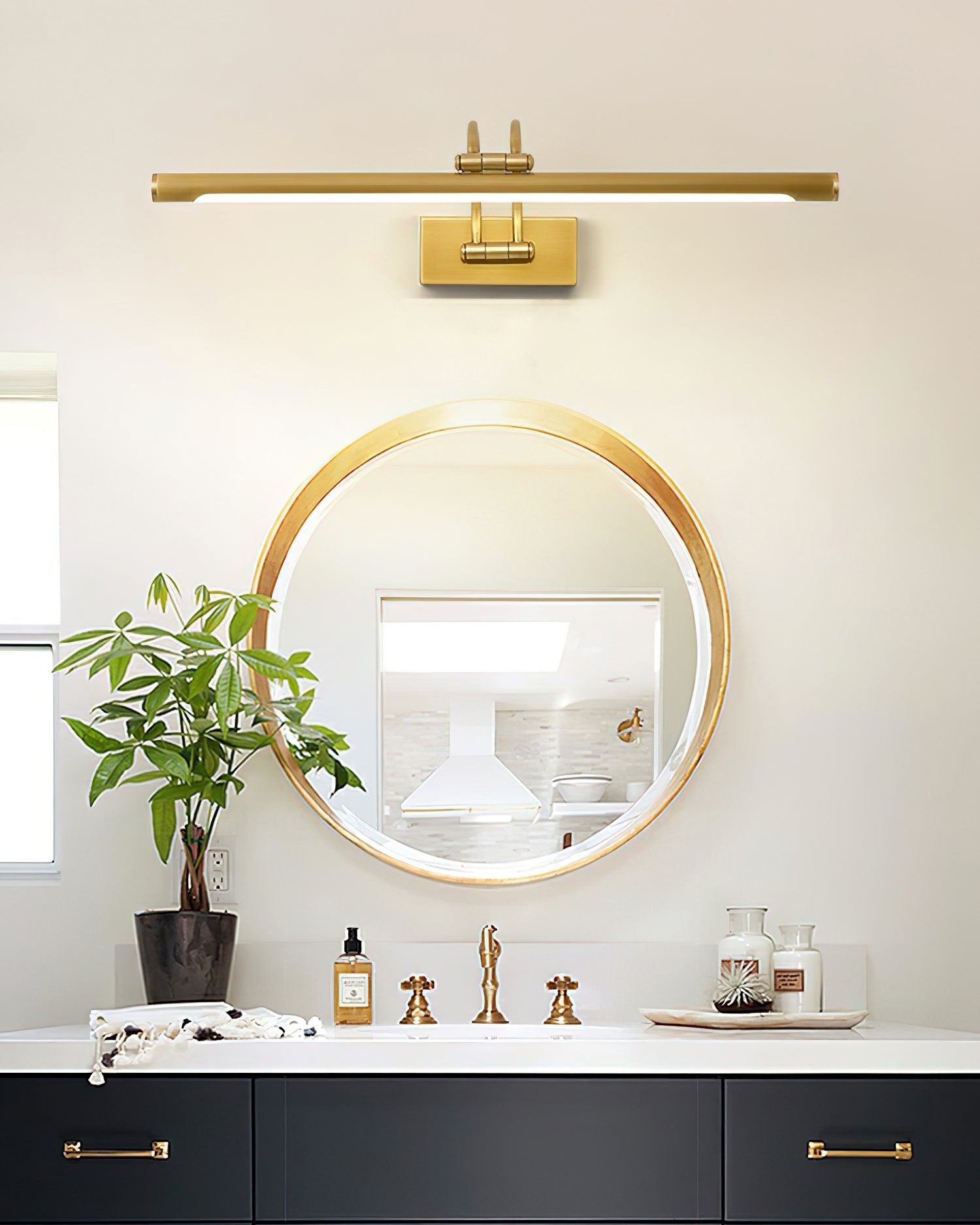 Dark bronze vanity wall light mounted above a bathroom mirror
