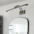 Linear vanity wall light glowing warm in a compact vanity corner