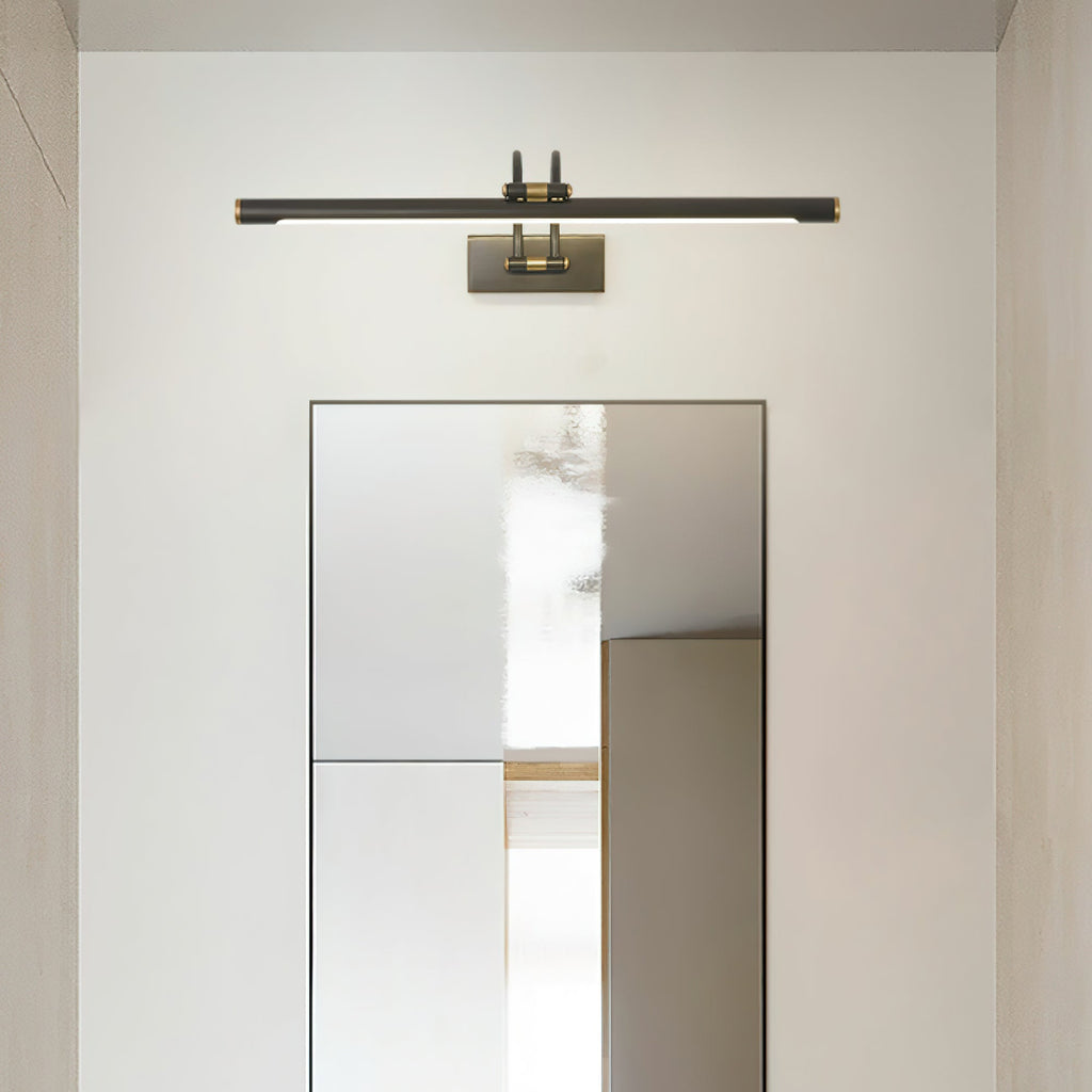 Dark bronze and brass vanity light casting soft even illumination