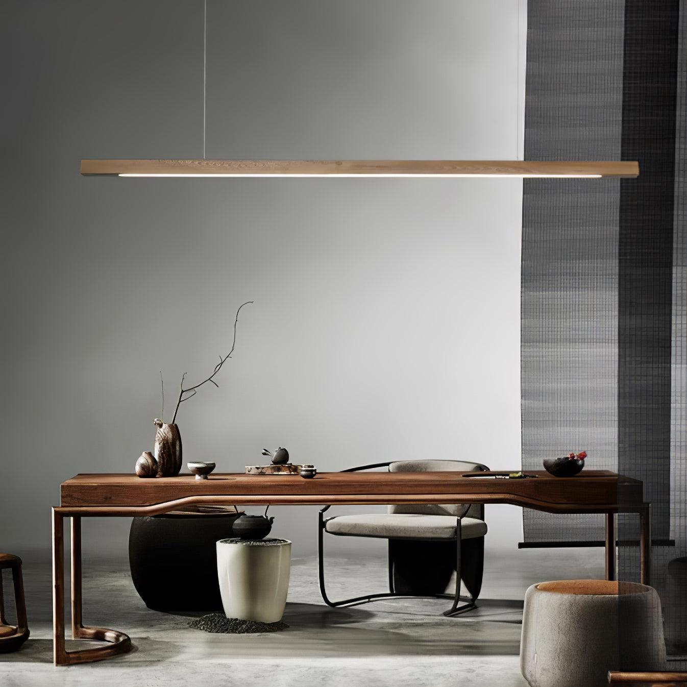 Linear wooden pendant light close detail of the lit underside