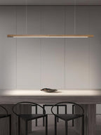 Wooden pendant light linear body suspended in a styled interior