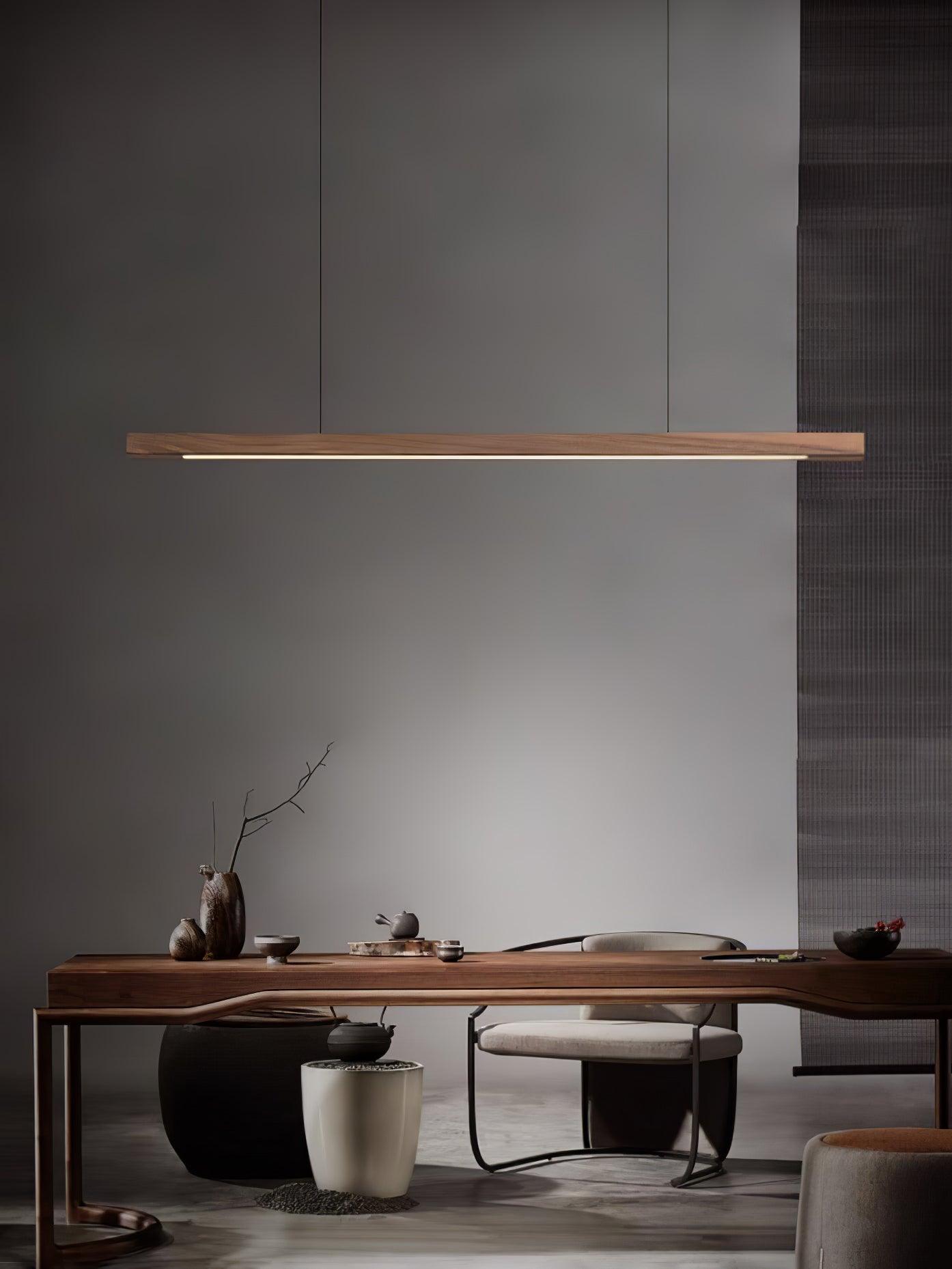 Wooden pendant light slim linear profile lit from within