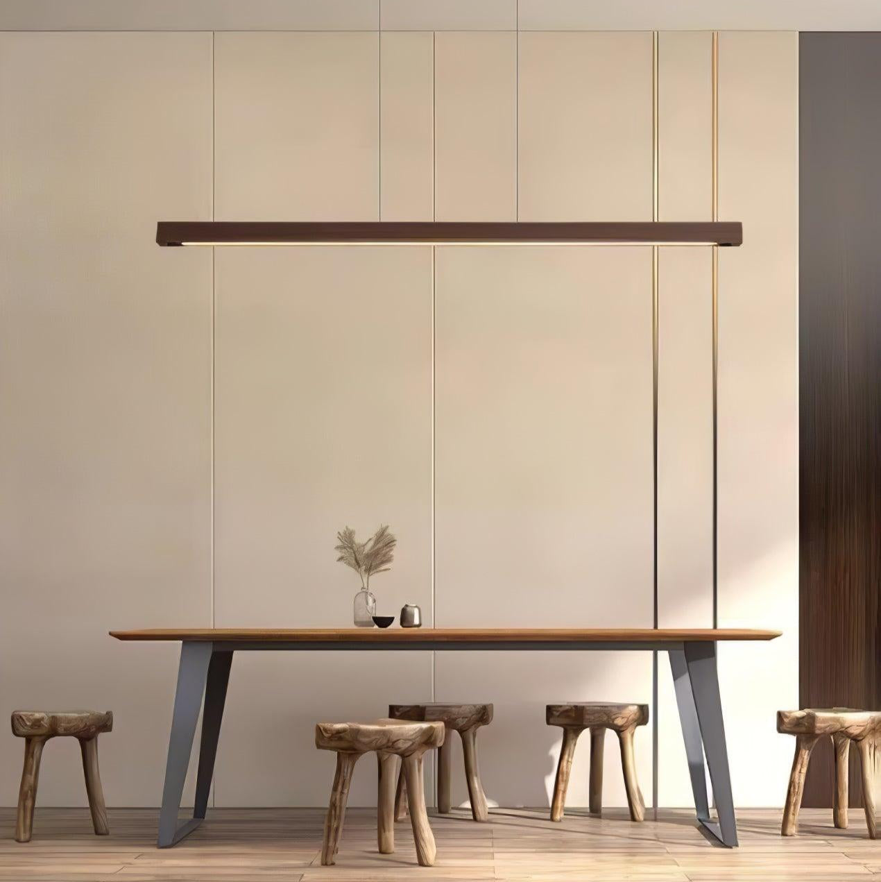 Wooden linear pendant light shown with warm light below