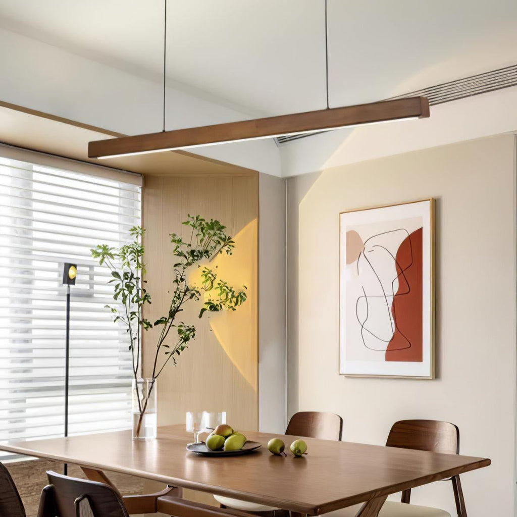 Wooden linear pendant light with warm grain and soft glow