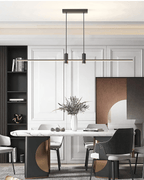 Linear bar pendant light suspended over a counter worktop