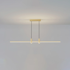 Linear bar pendant light glowing edge to edge over a counter