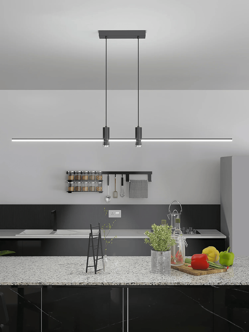 Linear bar pendant light hung above an island in a kitchen