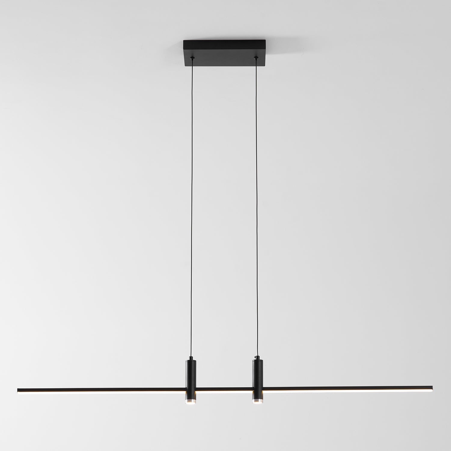 Linear bar pendant light close view of the glowing underside