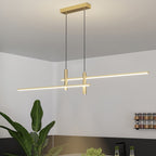 Linear pendant light hung above a kitchen island worktop