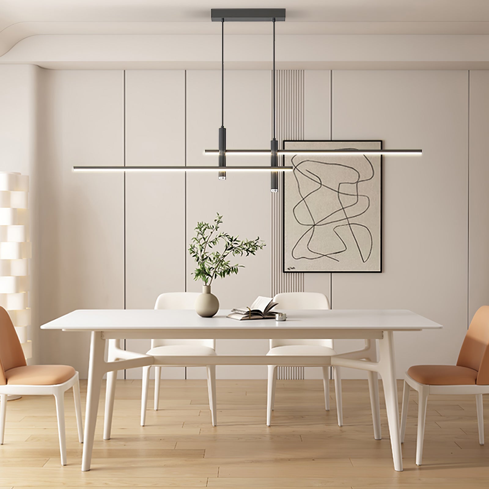 Linear pendant light glowing softly over a dining table