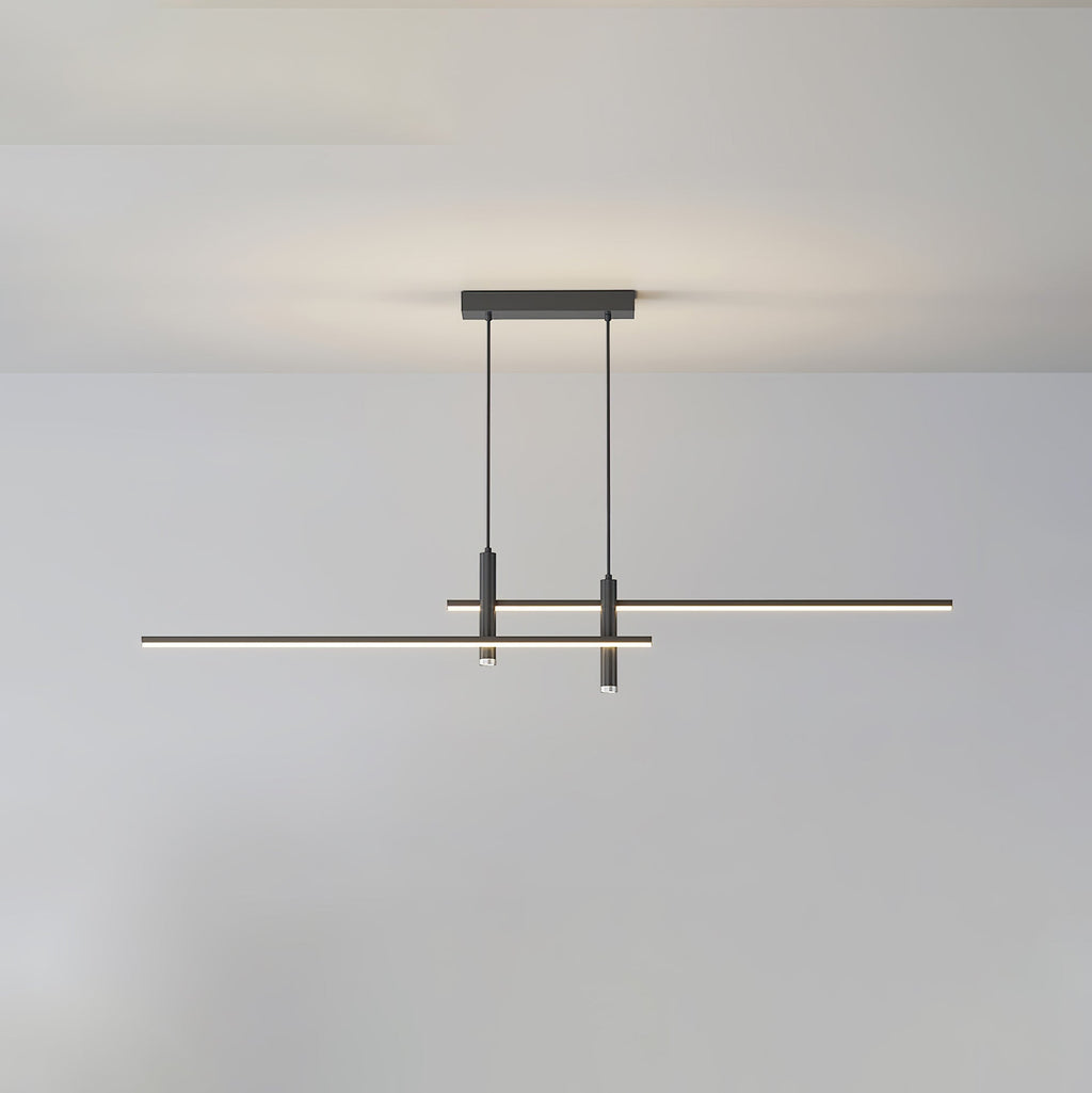 Linear pendant light with white shade glowing over a dining island
