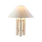 Clérachic table lamp on a plain white background, its wide conical shade catching warm lamplight from within.
