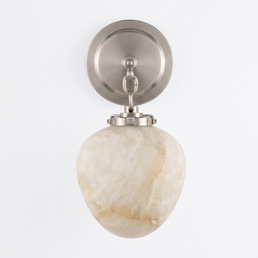 Front view of this Clérachic wall sconce in satin nickel finish, its alabaster shade catching light from below.