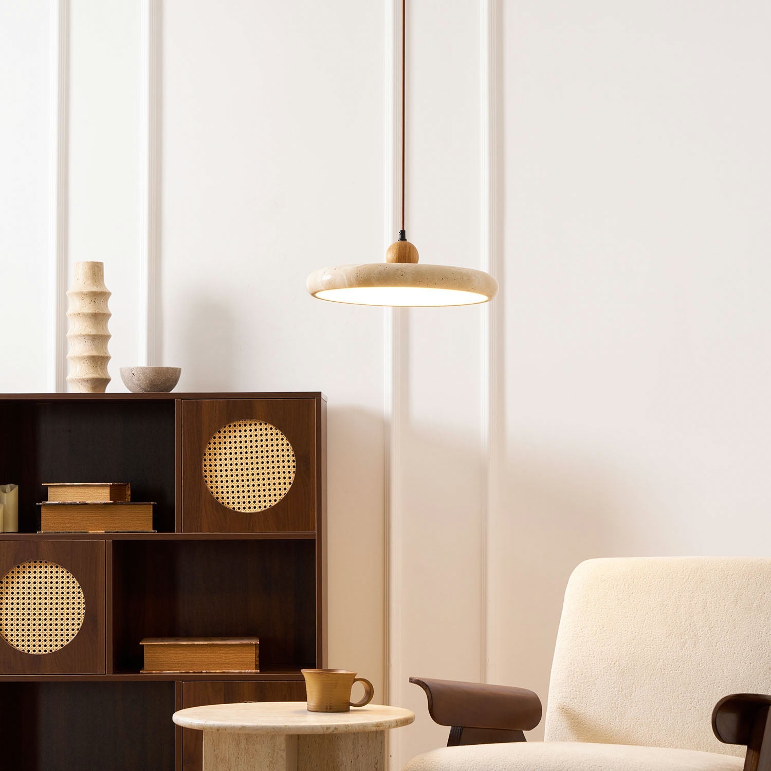 Natural stone pendant light showing unique travertine veining detail