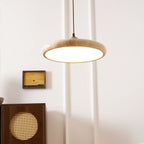 Round travertine stone pendant light with warm wooden frame