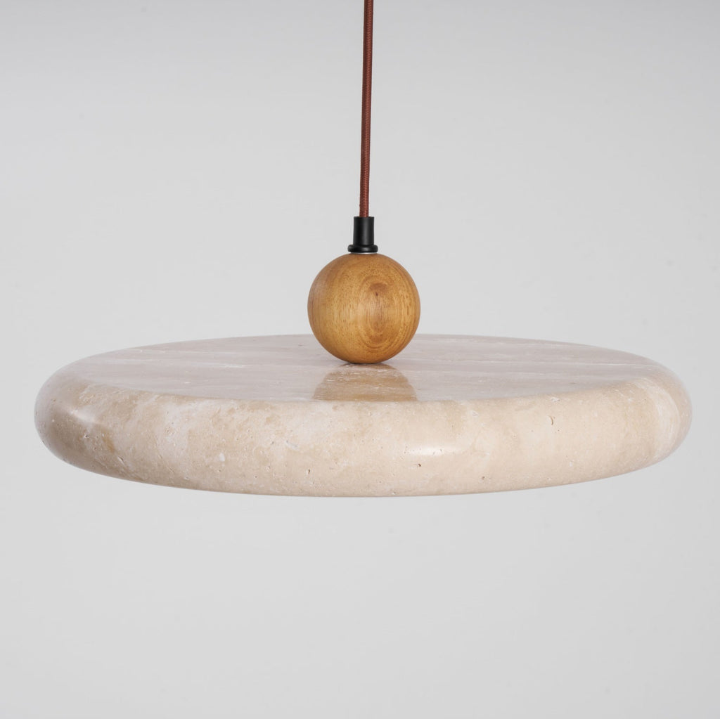 Travertine pendant light showing unique stone veining up close
