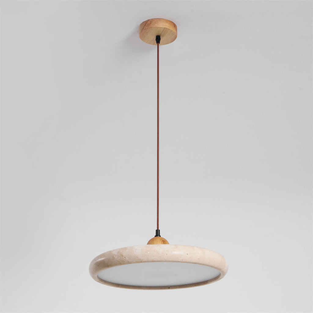 Natural travertine pendant light with wood frame in a warm room