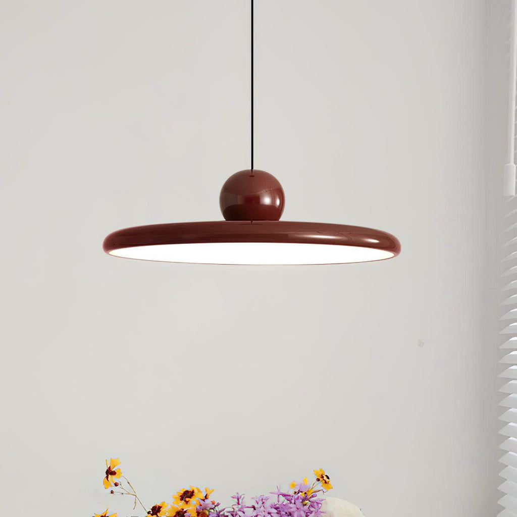 Round disc pendant light with soft even light in a room
