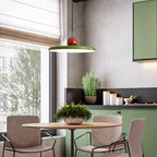 Round disc pendant light shown from below with warm glow