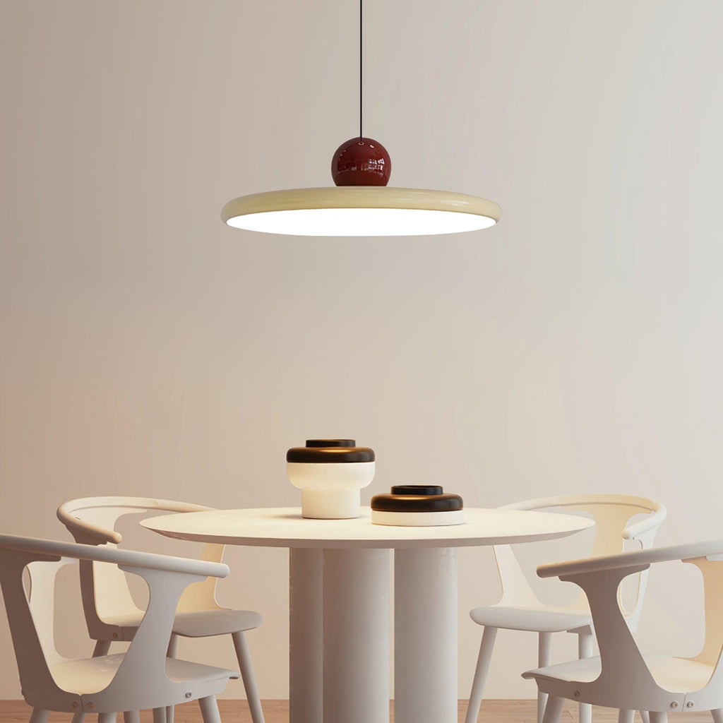 Round disc pendant light minimalist disc on a clean background