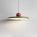 Pendant lamp disc shade glowing gently in an interior