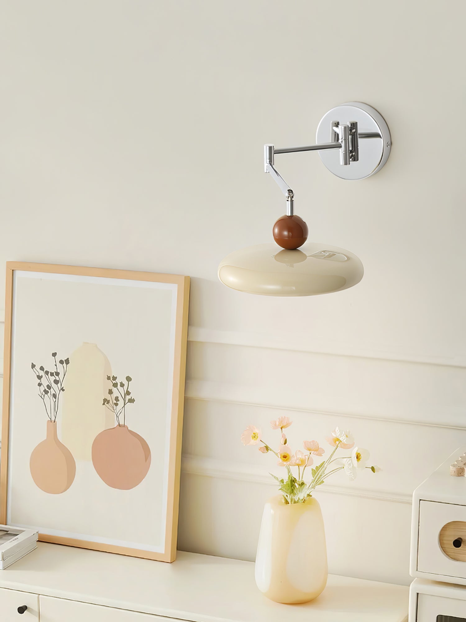 Round disc plug-in wall lamp shown from the side