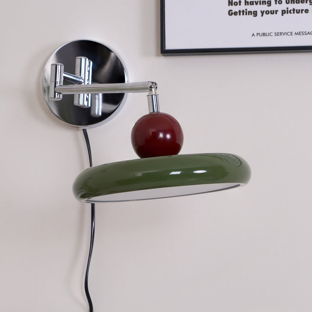 Round disc wall lamp angled view of the disc shade