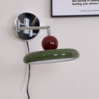 Round disc wall lamp angled view of the disc shade