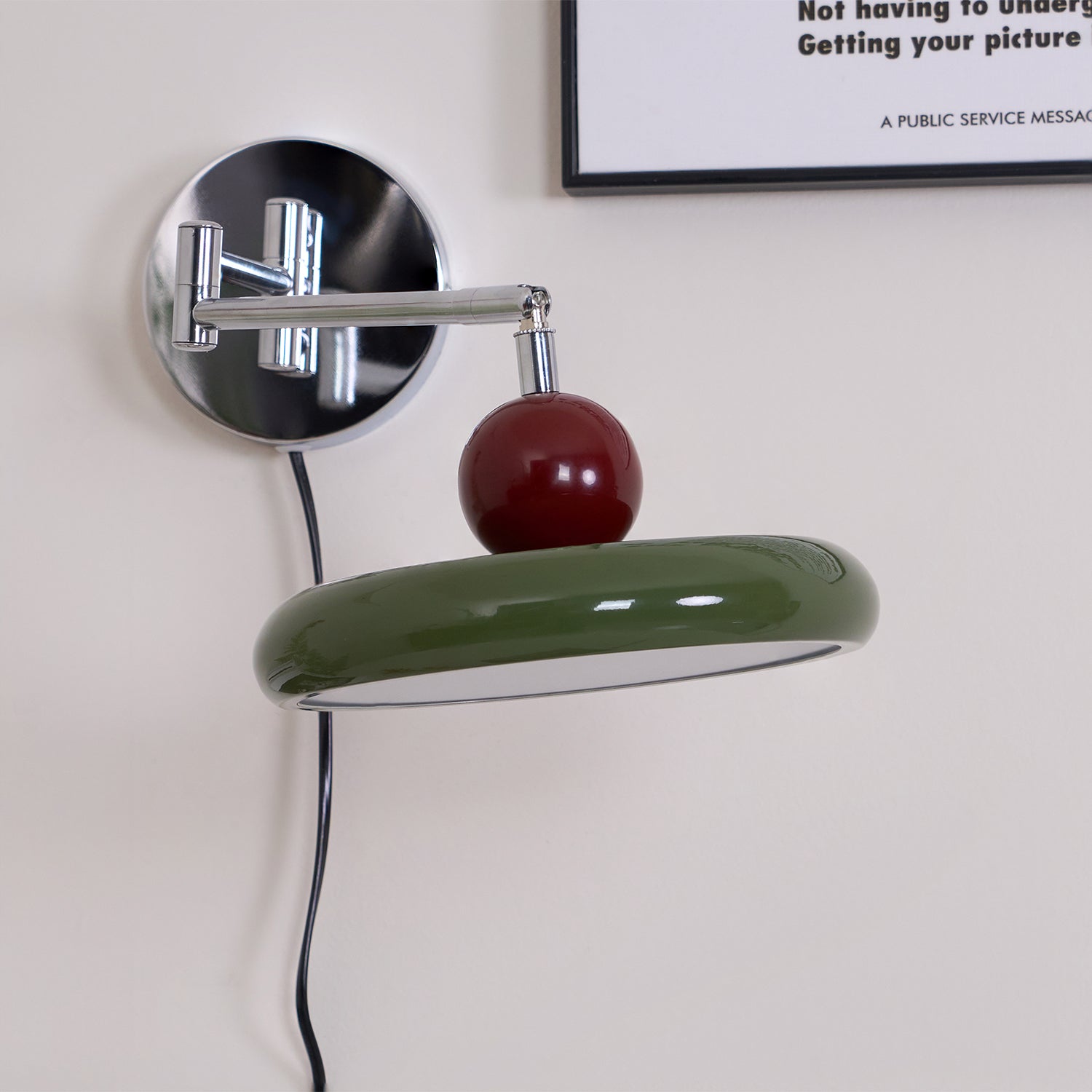 Round disc wall lamp angled view of the disc shade