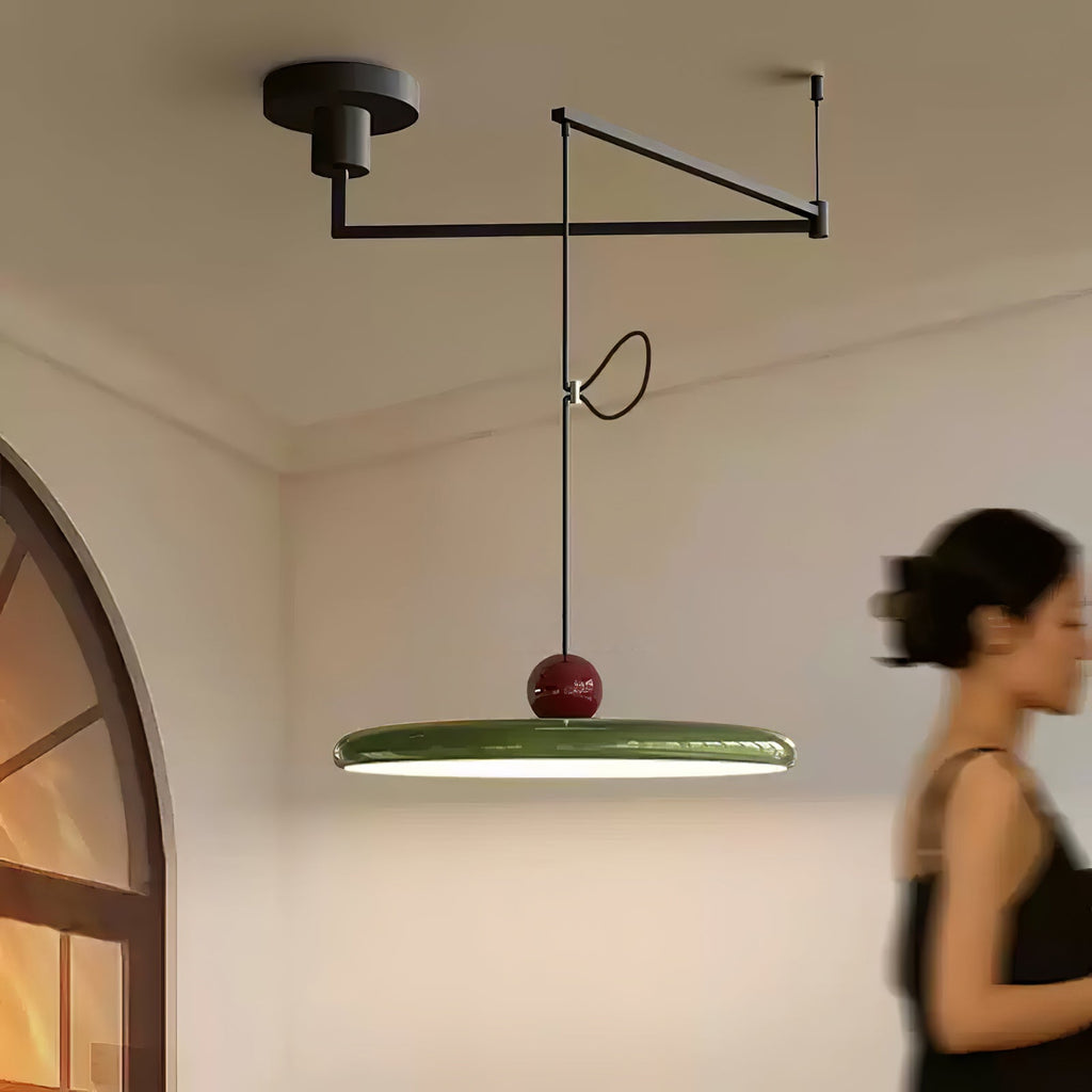 Mid-century swing arm pendant light with disc and sphere detail