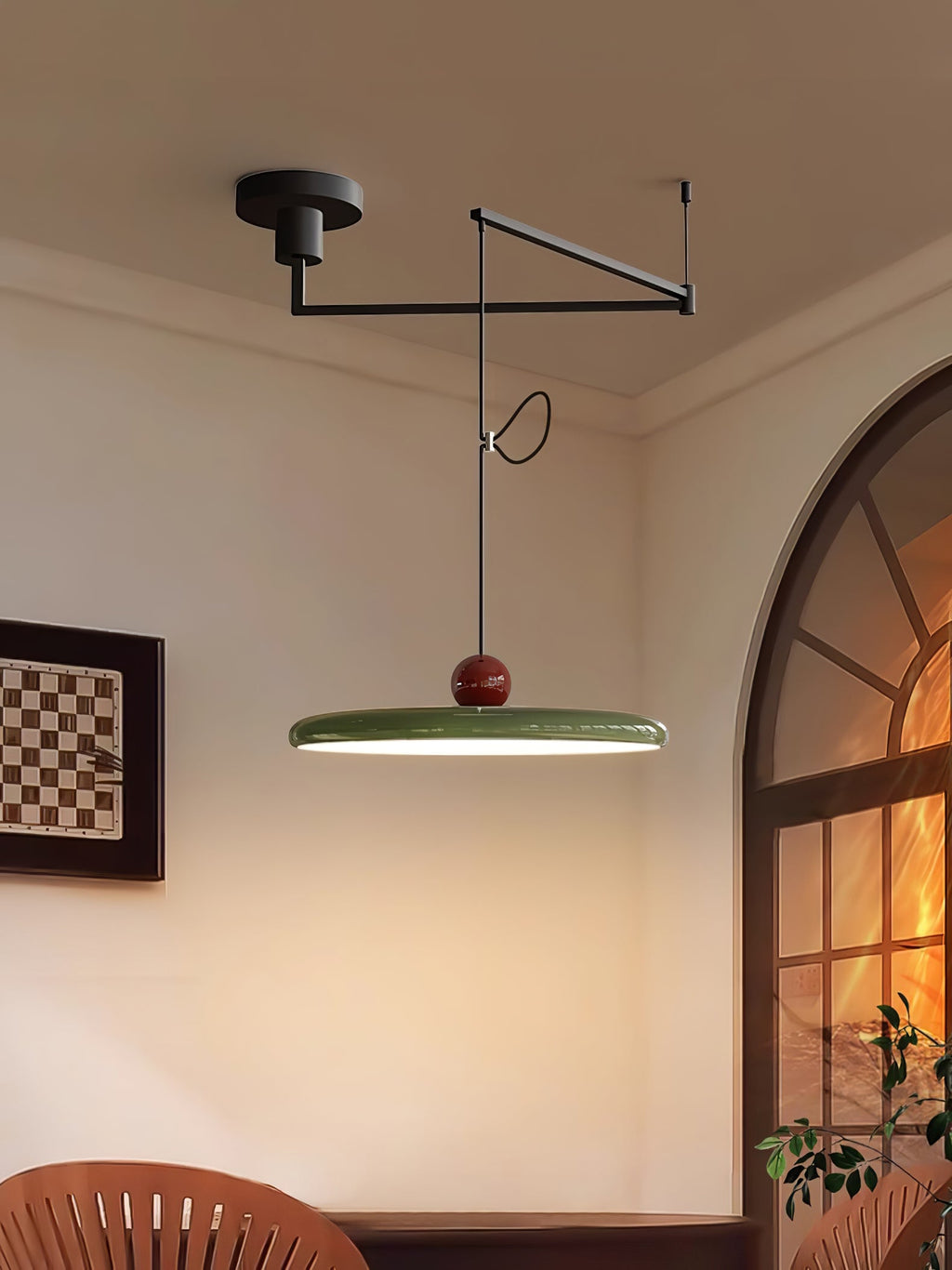 Mid-century disc pendant light with counterweight on a swing arm