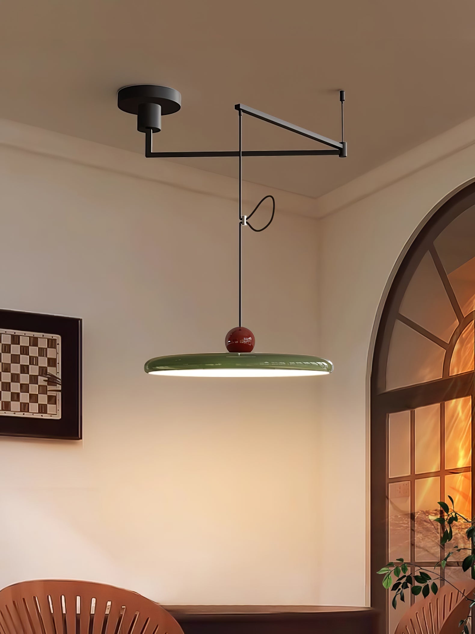 Mid-century disc pendant light with counterweight on a swing arm